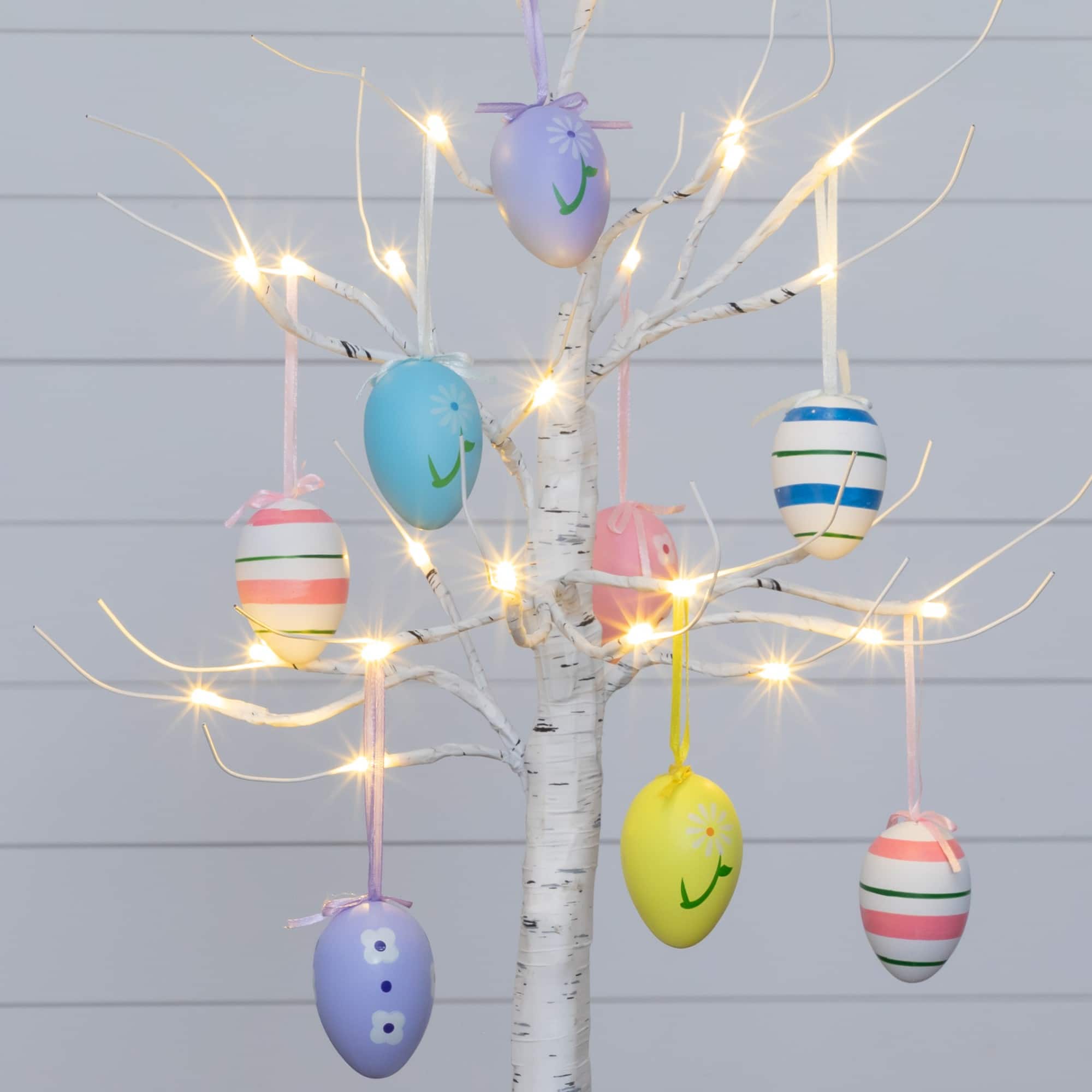 2ft. Pre-Lit Artificial Easter Twig Tree with Egg Ornaments and 24 Warm White LED Lights